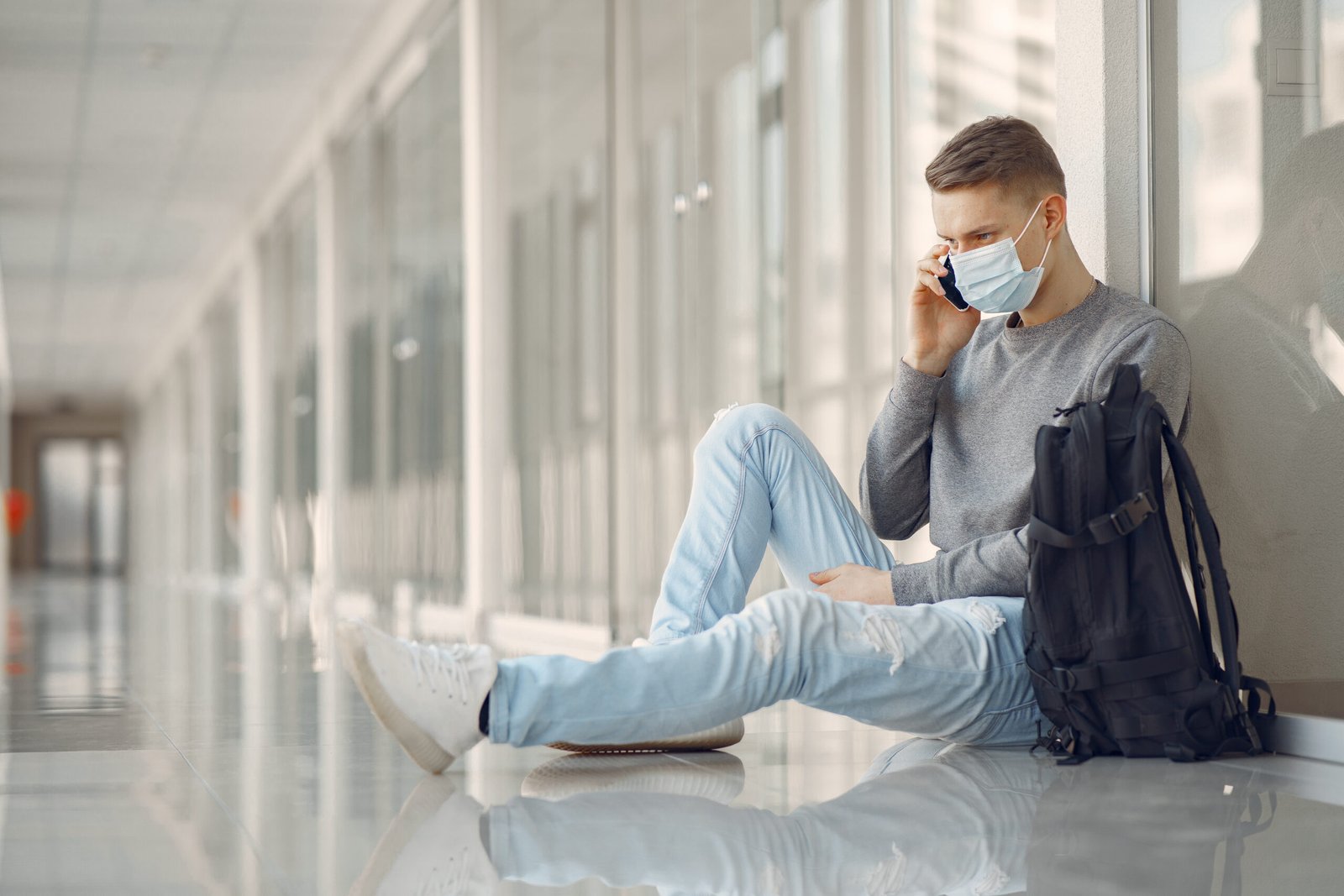 Airport terminal early morning with tired travelers